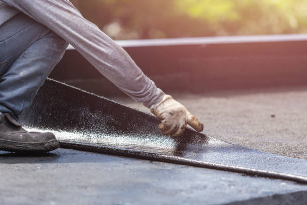 Professional Waterproofing technician working in Erie, IL